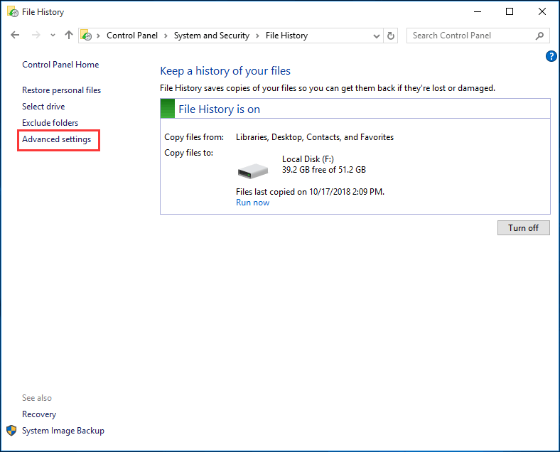 haga clic en configuración avanzada en la ventana Historial de archivos